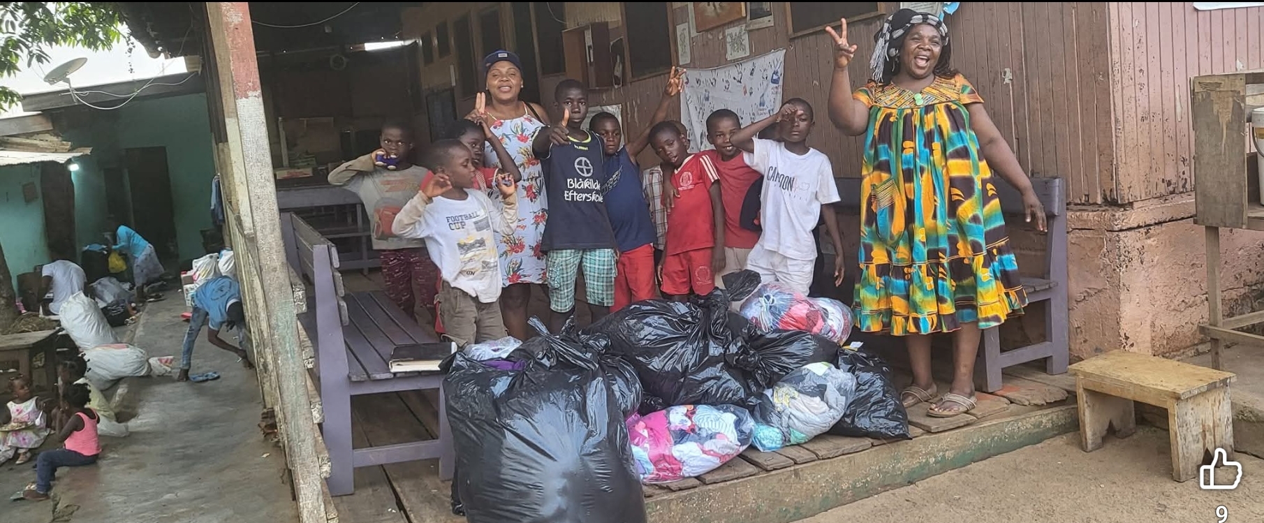 Open Heart Foundation team distributing aid to children in Bokoko Village
