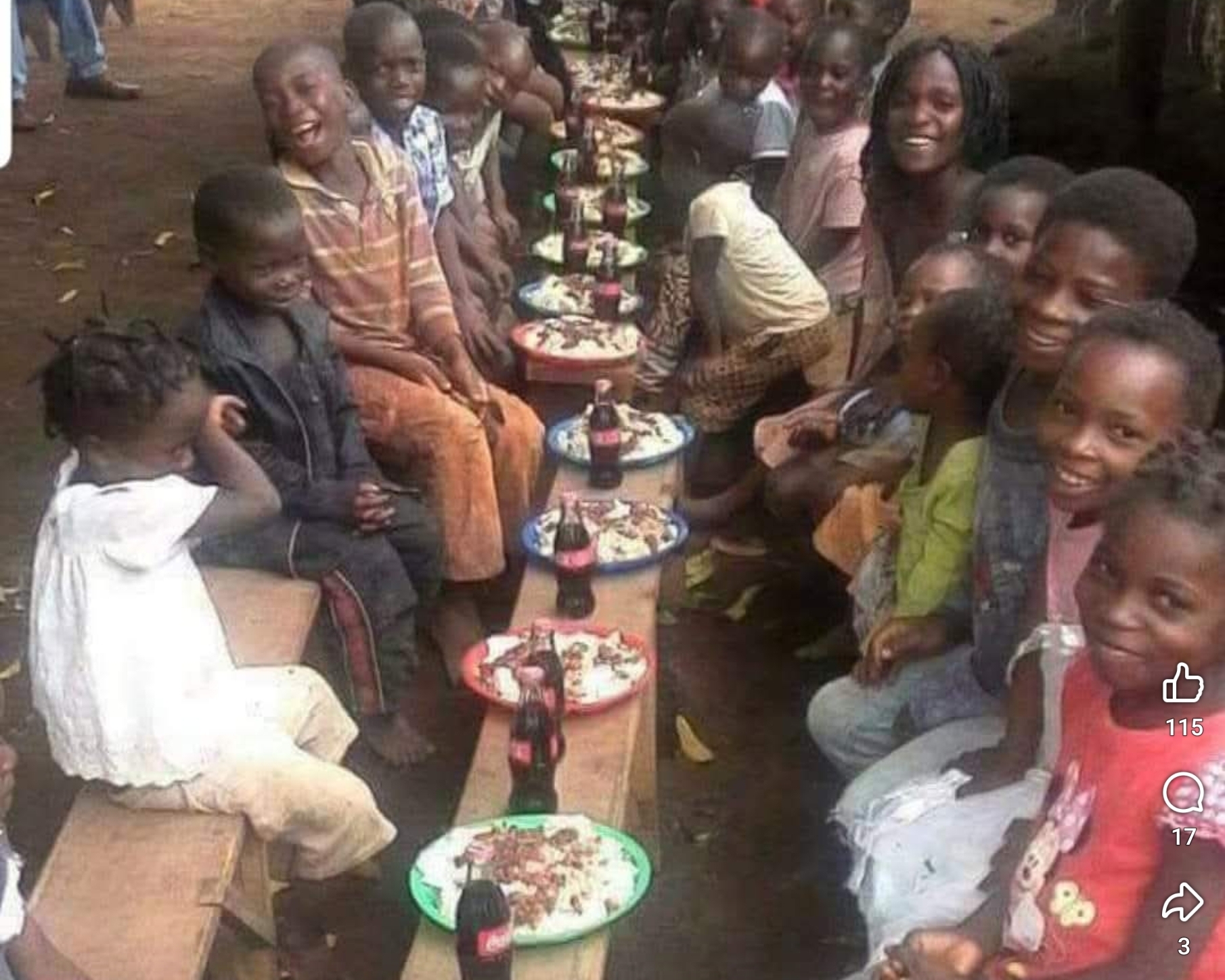 Children sharing a meal supported by Open Heart Foundation